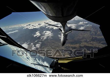 A U. S. Air Force B-1B Lancer is refueled over Afghanistan. View Large Photo Image Picture - A U. S. Air Force B-1B Lancer is refueled over Afghanistan.. Fotosearch