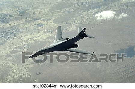 A U. S. Air Force B-1B Lancer on a combat patrol over Afghanistan. View Large Photo Image Picture - A U. S. Air Force B-1B Lancer on a combat patrol over Afghanistan.. Fotosearch