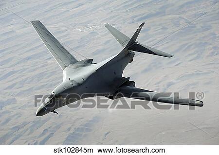 A U. S. Air Force B-1B Lancer on a combat patrol over Afghanistan. View Large Photo Image Picture - A U. S. Air Force B-1B Lancer on a combat patrol over Afghanistan.. Fotosearch