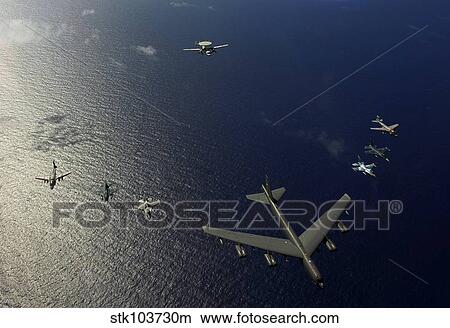 A U. S. Air Force B-52 Stratofortress aircraft leads a formation of aircraft. View Large Photo Image Picture - A U. S. Air Force B-52 Stratofortress aircraft leads a formation of aircraft.. Fotosearch