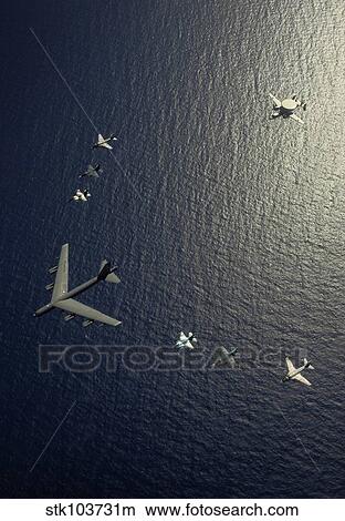 A U. S. Air Force B-52 Stratofortress aircraft leads a formation of aircraft. View Large Photo Image Picture - A U. S. Air Force B-52 Stratofortress aircraft leads a formation of aircraft.. Fotosearch