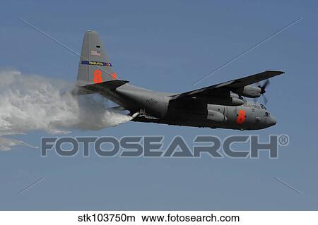 Picture - A U. S. Air Force C-130 Hercules releases its payload of water during training over South Carolina.. Fotosearch