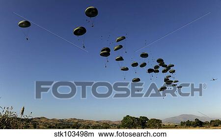 A U. S. Air Force C-17 Globemaster III airdrops pallets to Mirebalais, Haiti. View Large Photo Image Picture - A U. S. Air Force C-17 Globemaster III airdrops pallets to Mirebalais, Haiti.. Fotosearch