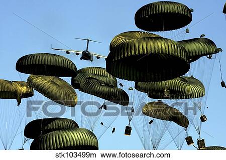 A U. S. Air Force C-17 Globemaster III airdrops pallets to Port-au-Prince, Haiti. View Large Photo Image Picture - A U. S. Air Force C-17 Globemaster III airdrops pallets to Port-au-Prince, Haiti.. Fotosearch