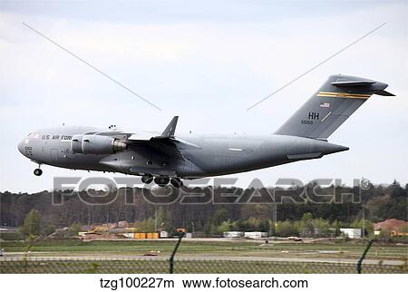 Picture - A U. S. Air Force C-17A Globemaster landing at Ramstein Air Base.. Fotosearch