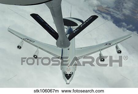A U. S. Air Force E-3 Sentry moves into refueling position. View Large Photo Image Picture - A U. S. Air Force E-3 Sentry moves into refueling position.. Fotosearch