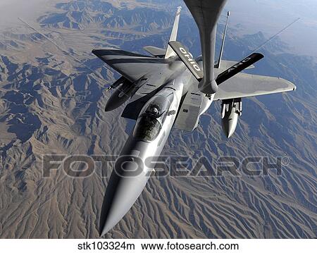 A U. S. Air Force F-15 Eagle flies toward the boom of a KC-135 Stratotanker. View Large Photo Image Picture - A U. S. Air Force F-15 Eagle flies toward the boom of a KC-135 Stratotanker.. Fotosearch
