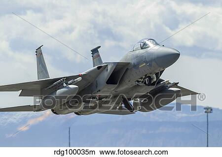 A U. S. Air Force F-15C Eagle taking off from Nellis Air Force Base. View Large Photo Image Picture - A U. S. Air Force F-15C Eagle taking off from Nellis Air Force Base.. Fotosearch