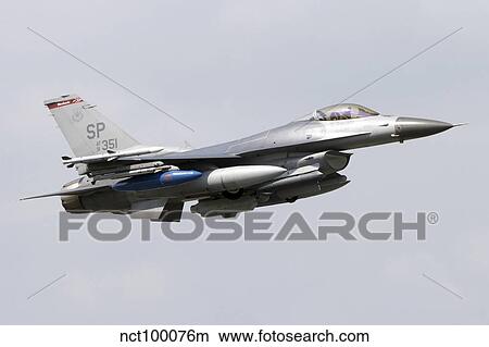 A U. S. Air Force F-16 Fighting Falcon in flight over Italy. View Large Photo Image Picture - A U. S. Air Force F-16 Fighting Falcon in flight over Italy.. Fotosearch