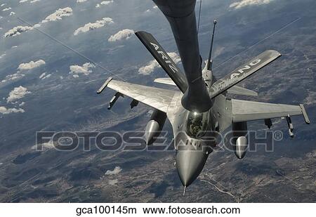 Picture - A U. S. Air Force F-16C Block 50 Fighting Falcon receives in-flight refueling.. Fotosearch