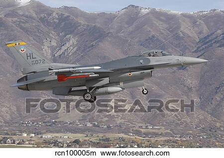 A U. S. Air Force F-16C Fighting Falcon landing at Hill Air Force Base, Utah. View Large Photo Image Picture - A U. S. Air Force F-16C Fighting Falcon landing at Hill Air Force Base, Utah.. Fotosearch