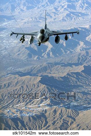 Picture - A U. S. Air Force F-16C Fighting Falcon in flight over Afghanistan.. Fotosearch