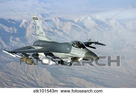 Picture - A U. S. Air Force F-16C Fighting Falcon in flight over Afghanistan.. Fotosearch