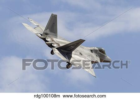 A U. S. Air Force F-22 Raptor prepares for landing. View Large Photo Image Picture - A U. S. Air Force F-22 Raptor prepares for landing.. Fotosearch