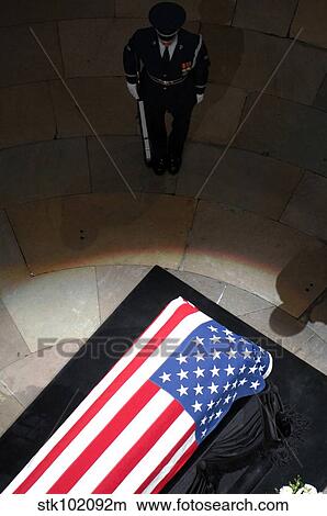 A U. S. Air Force Honor Guardsman stands watch over the casket. View Large Photo Image Picture - A U. S. Air Force Honor Guardsman stands watch over the casket.. Fotosearch