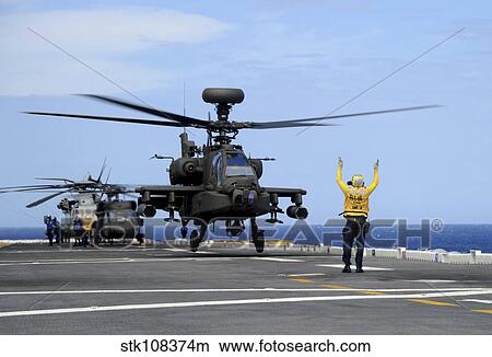 A U. S. Army AH-64E Apache Guardian launches from USS Peleliu. View Large Photo Image Picture - A U. S. Army AH-64E Apache Guardian launches from USS Peleliu.. Fotosearch