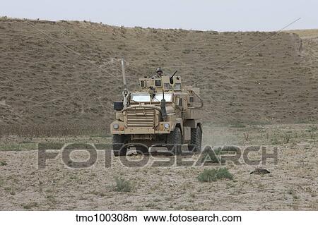 A U. S. Army Cougar patrols a wadi in Kunduz Afghanistan. View Large Photo Image Picture - A U. S. Army Cougar patrols a wadi in Kunduz Afghanistan.. Fotosearch