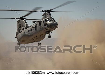 A U. S. Marine Corps CH-46E Sea Knight helicopter begins to land. View Large Photo Image Picture - A U. S. Marine Corps CH-46E Sea Knight helicopter begins to land.. Fotosearch