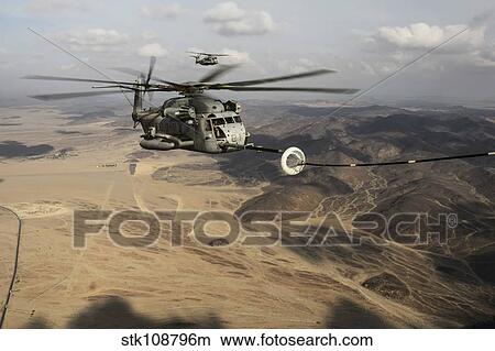 A U. S. Marine Corps CH-53E Super Stallion refueling over the Horn of Africa. View Large Photo Image Picture - A U. S. Marine Corps CH-53E Super Stallion refueling over the Horn of Africa.. Fotosearch