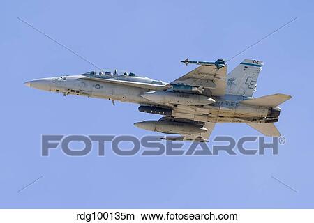A U. S. Marine Corps F/A-18D Hornet in flight over Nevada. View Large Photo Image Picture - A U. S. Marine Corps F/A-18D Hornet in flight over Nevada.. Fotosearch