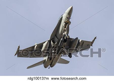 A U. S. Marine Corps F/A-18D Hornet prepares for landing. View Large Photo Image Picture - A U. S. Marine Corps F/A-18D Hornet prepares for landing.. Fotosearch