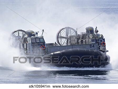 A U. S. Marine Corps landing craft air cushion transits at high speed. View Large Photo Image Picture - A U. S. Marine Corps landing craft air cushion transits at high speed.. Fotosearch