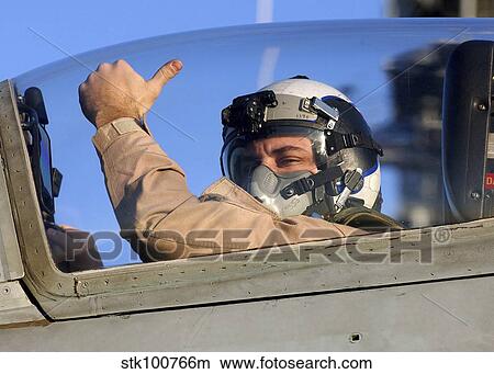 A U. S. Marine Corps pilot gives a thumbs-up signal prior to launching. View Large Photo Image Picture - A U. S. Marine Corps pilot gives a thumbs-up signal prior to launching.. Fotosearch