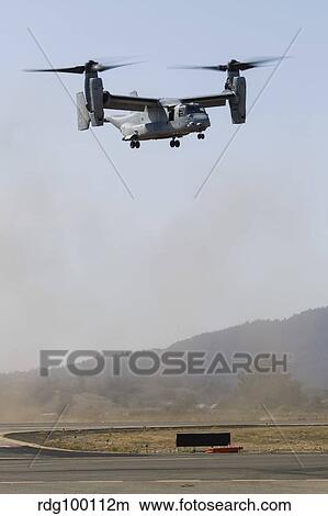 A U. S. Marine Corps V-22 Osprey hovers over Santa Rosa, California View Large Photo Image Picture - A U. S. Marine Corps V-22 Osprey hovers over Santa Rosa, California. Fotosearch