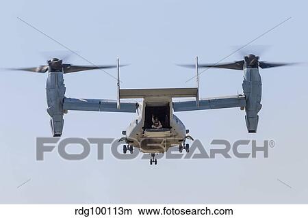 A U. S. Marine Corps V-22 Osprey hovers over Santa Rosa, California. View Large Photo Image Picture - A U. S. Marine Corps V-22 Osprey hovers over Santa Rosa, California.. Fotosearch