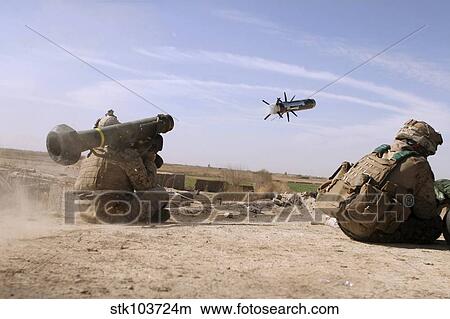 Picture - A U. S. Marine fires a Javelin anti-armor missile.. Fotosearch
