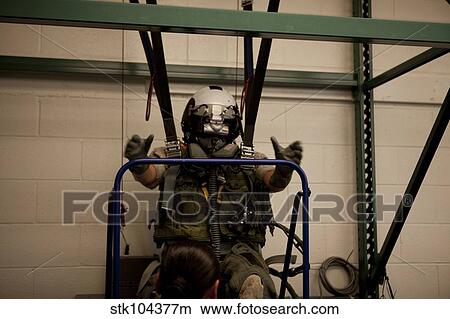 A U. S. Marine training in the virtual parachute trainer. View Large Photo Image Picture - A U. S. Marine training in the virtual parachute trainer.. Fotosearch