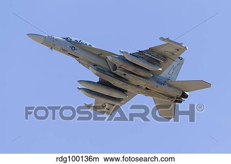 A U. S. Navy EA-18G Growler taking off. View Large Photo Image Picture - A U. S. Navy EA-18G Growler taking off.. Fotosearch