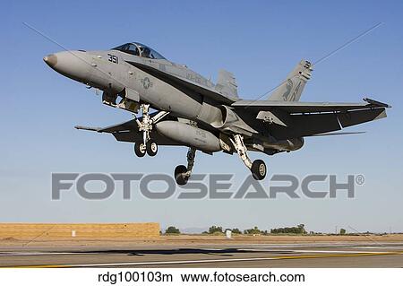 A U. S. Navy F/A-18C Hornet prepares for landing. View Large Photo Image Picture - A U. S. Navy F/A-18C Hornet prepares for landing.. Fotosearch