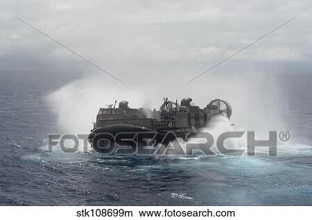 A U. S. Navy landing craft air cushion at high speed. View Large Photo Image Picture - A U. S. Navy landing craft air cushion at high speed.. Fotosearch