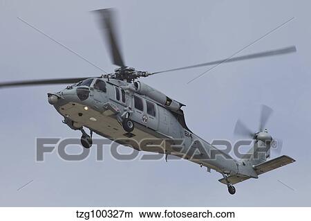 Picture - A U. S. Navy MH-60S Seahawk in flight over Coronado, California.. Fotosearch