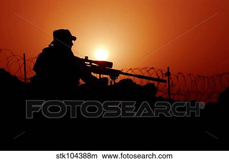 A U. S. Special Forces soldier armed with a Mk-12 Sniper Rifle at sunset. View Large Photo Image Picture - A U. S. Special Forces soldier armed with a Mk-12 Sniper Rifle at sunset.. Fotosearch