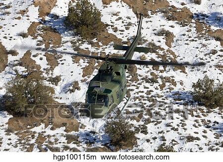 A UH-1N Twin Huey near Kirtland Air Force Base, New Mexico. View Large Photo Image Picture - A UH-1N Twin Huey near Kirtland Air Force Base, New Mexico.. Fotosearch
