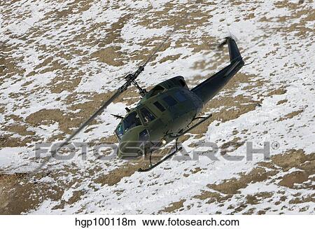 A UH-1N Twin Huey near Kirtland Air Force Base, New Mexico. View Large Photo Image Picture - A UH-1N Twin Huey near Kirtland Air Force Base, New Mexico.. Fotosearch