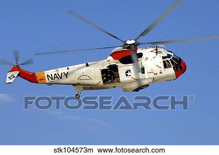 A UH-3H Sea King helicopter flies a search and rescue training mission. View Large Photo Image Picture - A UH-3H Sea King helicopter flies a search and rescue training mission.. Fotosearch