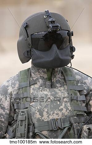 A UH-60 Black Hawk helicopter crew chief. View Large Photo Image Picture - A UH-60 Black Hawk helicopter crew chief.. Fotosearch