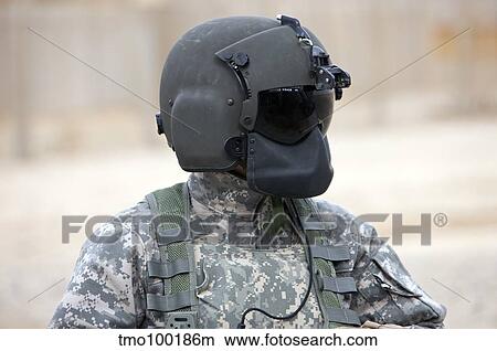 Picture - A UH-60 Black Hawk helicopter crew chief.. Fotosearch
