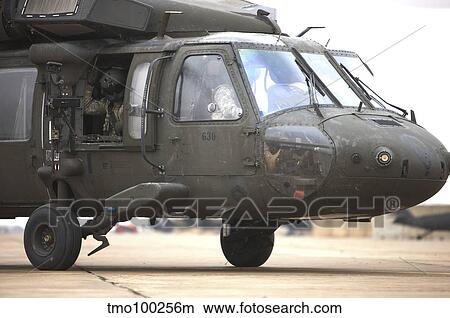 A UH-60 Black Hawk taxis out for a mission over northern Iraq. View Large Photo Image Picture - A UH-60 Black Hawk taxis out for a mission over northern Iraq.. Fotosearch
