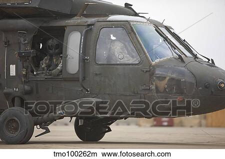 A UH-60 Black Hawk taxis out for a mission over northern Iraq. View Large Photo Image Picture - A UH-60 Black Hawk taxis out for a mission over northern Iraq.. Fotosearch