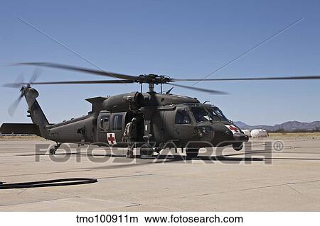 A UH-60 Blackhawk helicopter at Davis-Monthan Air Force Base. View Large Photo Image Picture - A UH-60 Blackhawk helicopter at Davis-Monthan Air Force Base.. Fotosearch