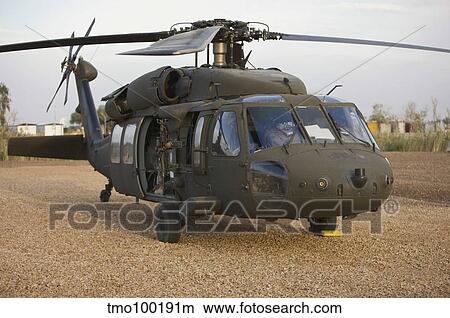 A UH-60L Black Hawk with twin M240G machine guns. View Large Photo Image Picture - A UH-60L Black Hawk with twin M240G machine guns.. Fotosearch