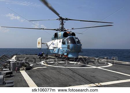 A Ukrainian Navy KA-27 Helix helicopter on the flight deck of USS Taylor. View Large Photo Image Picture - A Ukrainian Navy KA-27 Helix helicopter on the flight deck of USS Taylor.. Fotosearch