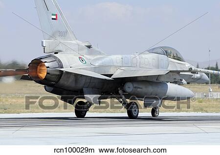 A United Arab Emirates Air Force F-16E Block 60 taking off. View Large Photo Image Picture - A United Arab Emirates Air Force F-16E Block 60 taking off.. Fotosearch