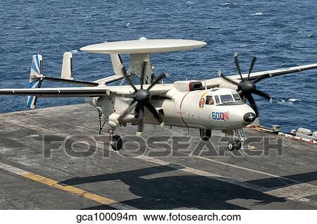 Picture - A US Navy E-2C Hawkeye prepares to land aboard USS Eisenhower.. Fotosearch