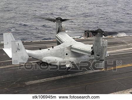 A V-22 Osprey lands aboard the aircraft carrier USS Harry S. Truman. View Large Photo Image Picture - A V-22 Osprey lands aboard the aircraft carrier USS Harry S. Truman.. Fotosearch