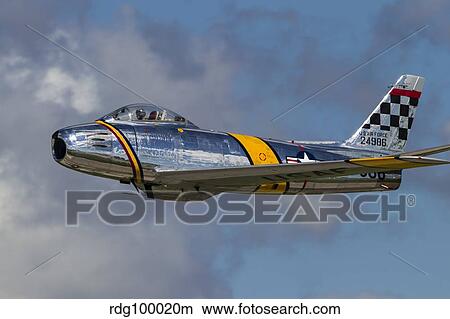 A vintage F-86 Sabre of the Warbird Heritage Foundation. View Large Photo Image Picture - A vintage F-86 Sabre of the Warbird Heritage Foundation.. Fotosearch